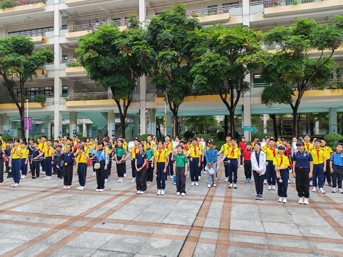 Students participating in an outdoor cultural activity.